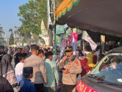 Sat Binmas Polres Lombok Timur Laksanakan Public Address pada Hultah ke-91 Madrasah NWDI Anjani